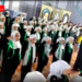 Children express devotion to the Iranian regime in an İstanbul mosque, giving a military salute to Khomeini